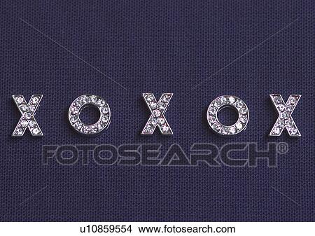 Love Tokens, Love, Romance, Circle, Close-Up View Large Photo Image Picture - Love Tokens, Love, Romance, Circle, Close-Up. Fotosearch