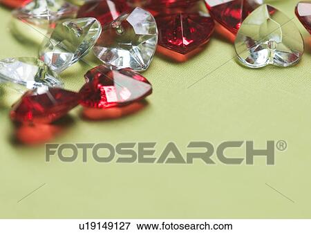 Love Tokens, Love, Romance, Close-Up, Colored Background View Large Photo Image Stock Photo - Love Tokens, Love, Romance, Close-Up, Colored Background. Fotosearch