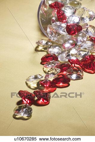 Love Tokens, Love, Romance, Close-Up, Colored Background View Large Photo Image Stock Photography - Love Tokens, Love, Romance, Close-Up, Colored Background. Fotosearch