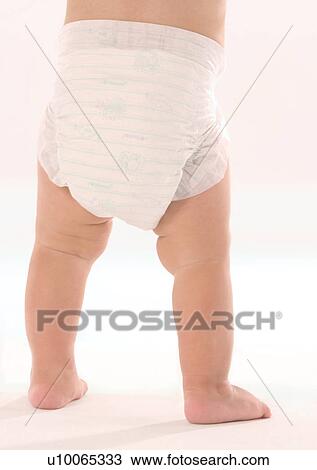 Stock Image - Barefoot, Diaper, Close-Up, About Babies. Fotosearch