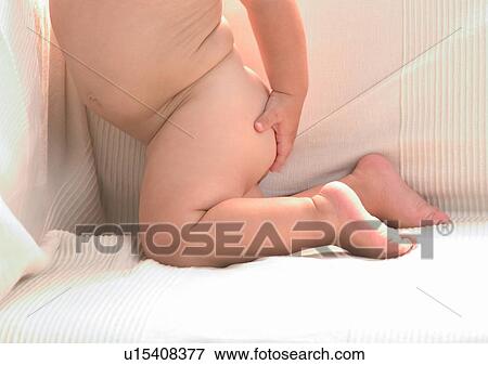 Stock Photo - Barefoot, Diaper, Close-Up, About Babies. Fotosearch