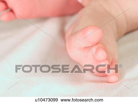 Stock Photo - Barefoot, Human Foot, Close-Up, About Babies. Fotosearch