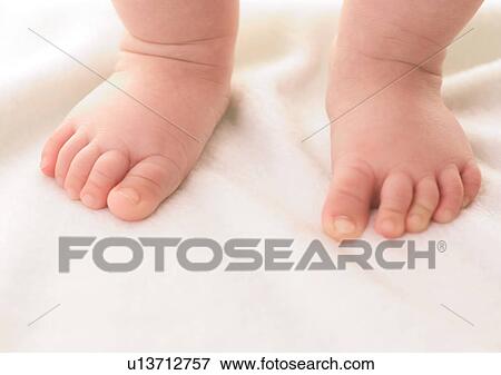 Stock Photo - Barefoot, Human Foot, Close-Up, About Babies. Fotosearch