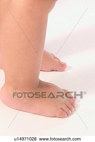 Stock Photo - Barefoot, Human Foot, Close-Up, About Babies. Fotosearch