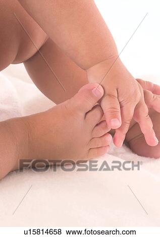 Stock Photo - Barefoot, Human Foot, Close-Up, About Babies. Fotosearch