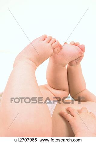 Stock Photography - Barefoot, Human Foot, Close-Up, About Babies. Fotosearch
