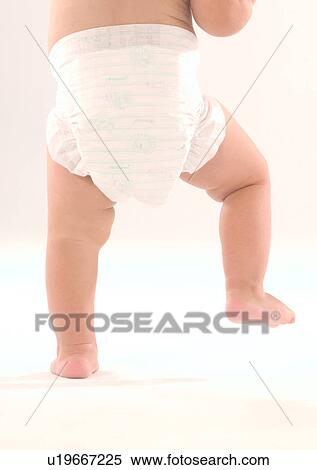 Stock Photography - Barefoot, Human Leg, Diaper, Close-Up, About Babies. Fotosearch