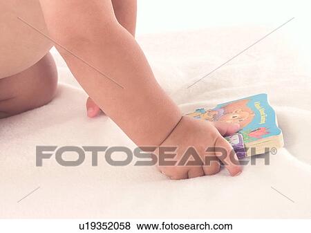 Close-Up, Human Hand, Holding, About Babies View Large Photo Image Stock Photo - Close-Up, Human Hand, Holding, About Babies. Fotosearch
