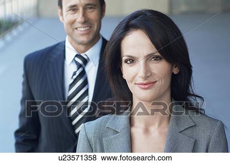 Stock Photo - Businesswoman and businessman (portrait). Fotosearch