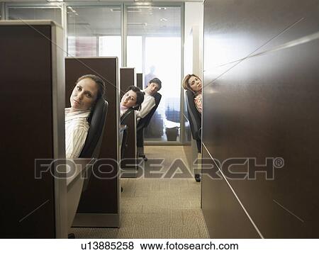 Office workers at desks (portrait) View Large Photo Image Stock Photo - Office workers at desks (portrait). Fotosearch