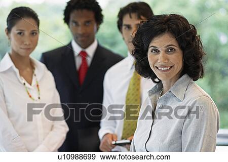 Stock Photo - Portrait of Four Businesspeople. Fotosearch