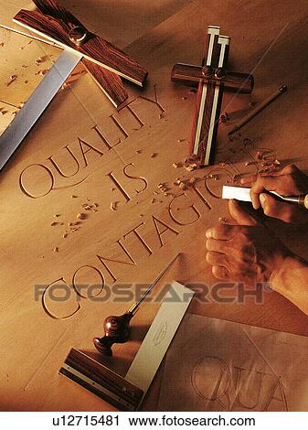 Stock Image - Making a Wooden Sign. Fotosearch