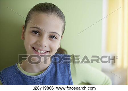 Stock Photograph - Girl smiling (portrait). Fotosearch