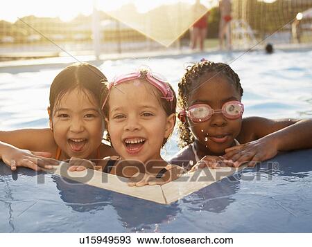 Three girls in swimming pool (portrait) View Large Photo Image Stock Image - Three girls in swimming pool (portrait). Fotosearch