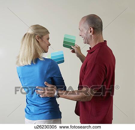 Mature couple looking at color swatches View Large Photo Image Stock Photography - Mature couple looking at color swatches. Fotosearch