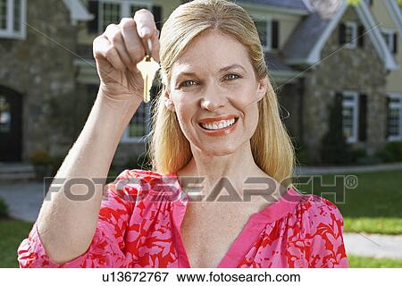Mature Woman Holding House Keys View Large Photo Image Stock Photo - Mature Woman Holding House Keys. Fotosearch