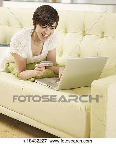 Young Woman Internet Shopping View Large Photo Image Stock Photo - Young Woman Internet Shopping. Fotosearch