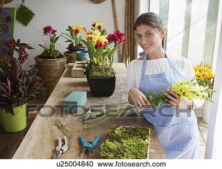 Stock Image - Female florist (portrait). Fotosearch