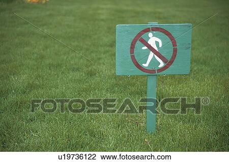 Stock Image - A Lawn And The Sign Of Do Not Enter. Fotosearch