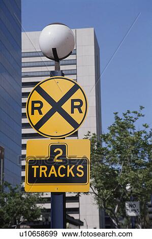 Stock Photo - A Sign And A Building. Fotosearch