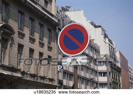 Stock Photography - A Sign And A Town. Fotosearch