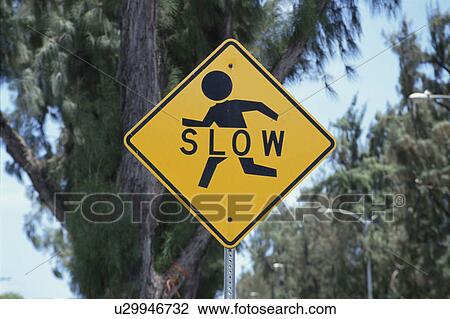 Stock Image - A Sign And Trees. Fotosearch