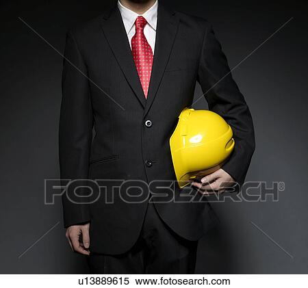 Businessman Holding Hard Hat View Large Photo Image Stock Photography - Businessman Holding Hard Hat. Fotosearch