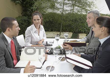 Business meeting in restaurant View Large Photo Image Picture - Business meeting in restaurant. Fotosearch