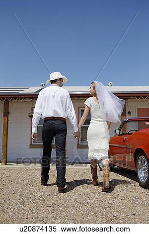 Newlyweds arriving at motel View Large Photo Image Stock Photography - Newlyweds arriving at motel. Fotosearch