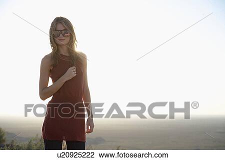 Young woman in desert, Arizona, USA View Large Photo Image Stock Image - Young woman in desert, Arizona, USA. Fotosearch