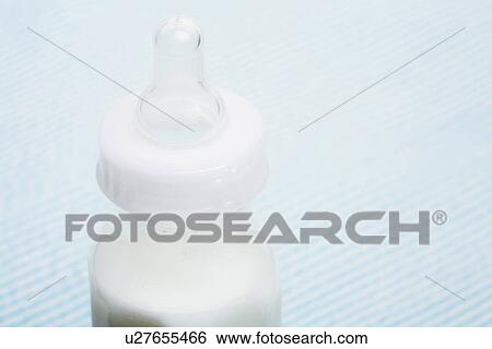 Baby bottle (close-up) View Large Photo Image Stock Photograph - Baby bottle (close-up). Fotosearch