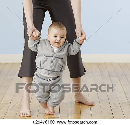 Baby Boy Learning to Walk View Large Photo Image Stock Image - Baby Boy Learning to Walk. Fotosearch