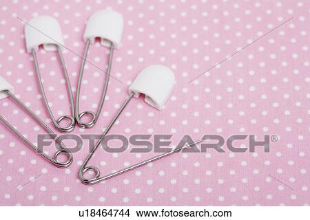 Four napkin pins View Large Photo Image Picture - Four napkin pins. Fotosearch