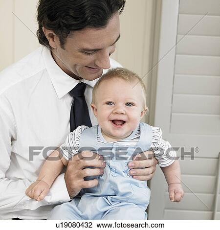 Mid adult man with son (1-2) View Large Photo Image Stock Image - Mid adult man with son (1-2). Fotosearch