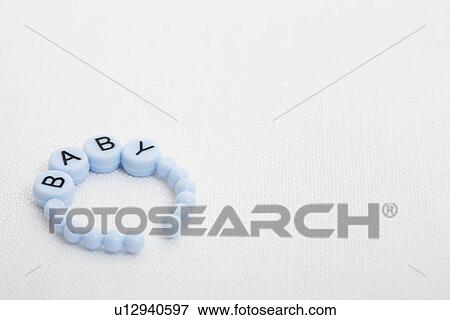 Single baby bracelets View Large Photo Image Stock Photo - Single baby bracelets. Fotosearch