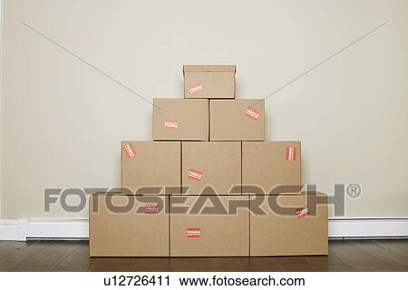 Cardboard boxes in a pile View Large Photo Image Stock Image - Cardboard boxes in a pile. Fotosearch