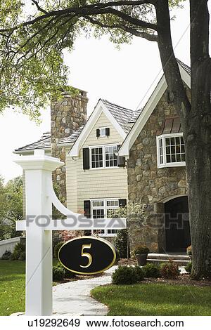 Stock Photo - Number sign near house, Chatham, New Jersey, USA. Fotosearch