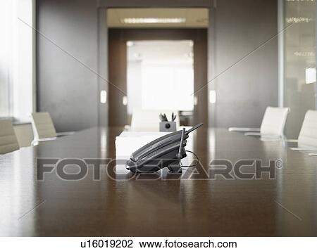 Telephone on conference table View Large Photo Image Stock Image - Telephone on conference table. Fotosearch