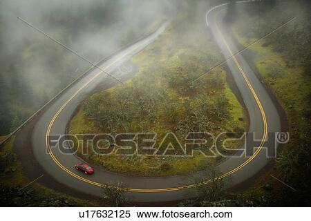 Car On Hairpin Curve In Highway Stock Photography U17632125