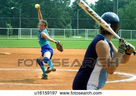 Female Softball Player Pitching To A Batter View Large Photo Image Stock Photo - Female Softball Player Pitching To A Batter. Fotosearch