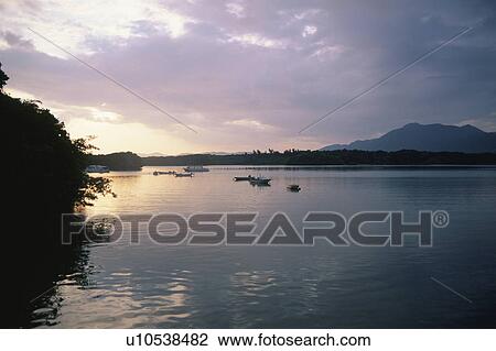 Stock Image - The Sky On Sunset And The Sea. Fotosearch