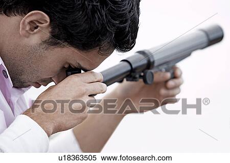 Young Man Using Telescope View Large Photo Image Stock Photography - Young Man Using Telescope. Fotosearch