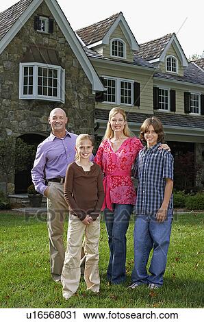 Family with Two Children Near House View Large Photo Image Stock Image - Family with Two Children Near House. Fotosearch