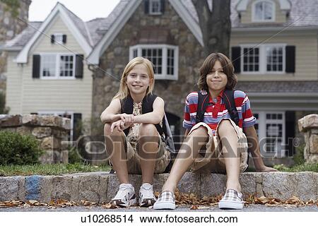 Sister and brother with school bags, Chatham, New Jersey, USA View Large Photo Image Picture - Sister and brother with school bags, Chatham, New Jersey, USA. Fotosearch