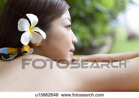 Stock Photo - Close-up of young woman, Saipan. Fotosearch