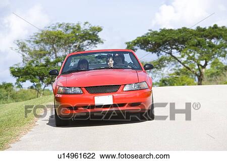 Young people in the car, man driving, Saipan, USA View Large Photo Image Stock Image - Young people in the car, man driving, Saipan, USA . Fotosearch