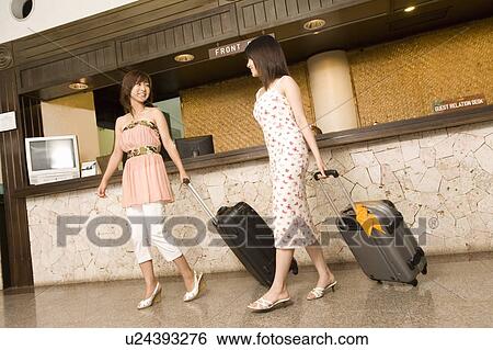 Young Women at the front desk, Saipan View Large Photo Image Stock Photograph - Young Women at the front desk, Saipan. Fotosearch
