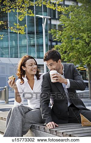 Well-Dressed Couple Having Lunch View Large Photo Image Stock Image - Well-Dressed Couple Having Lunch. Fotosearch