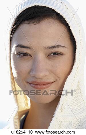 Young woman wearing hood (portrait) View Large Photo Image Stock Image - Young woman wearing hood (portrait). Fotosearch