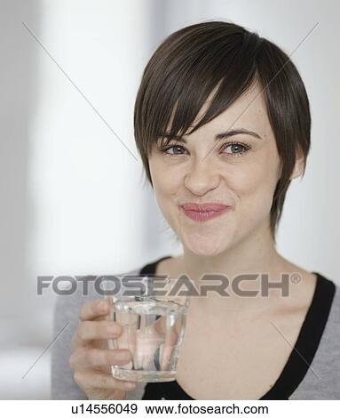 Stock Photo - Young Woman Drinking Water. Fotosearch